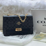 Coach Mid Button Sling Bag