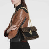 Louis Vuitton Victoire Monogram Shoulder Bag